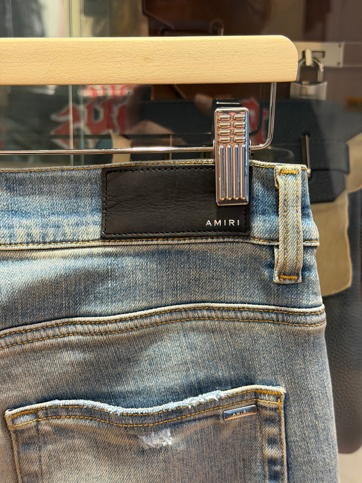 Amiri MX1 Distressed Skinny Jeans - Light Wash/Black Patches