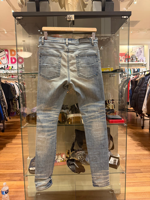 Amiri Paint Splatter Distressed Skinny Jeans