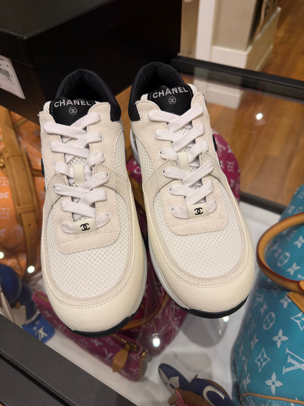 Chanel Trainer Sneakers - White / Black