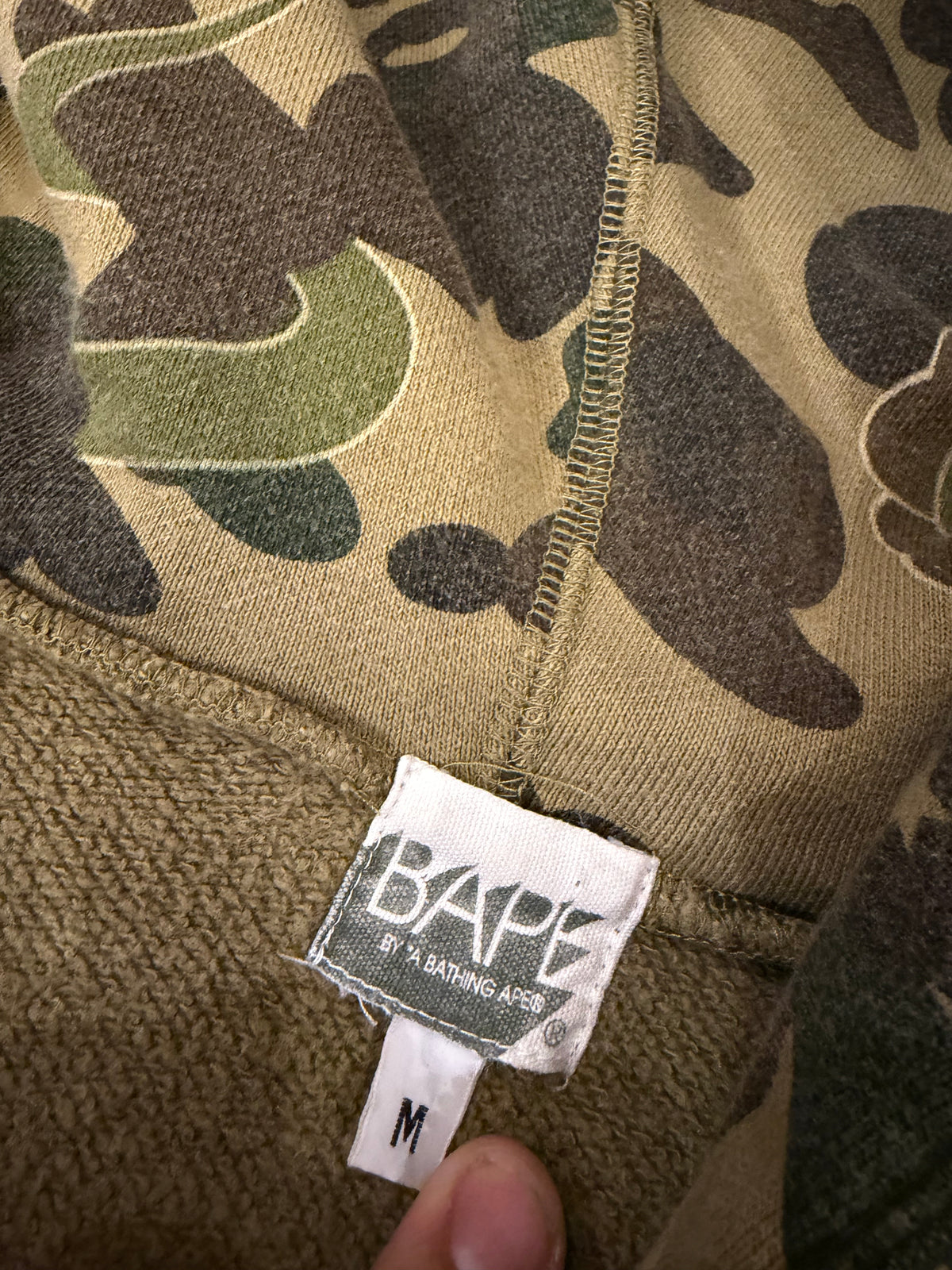 Bape x KAWS 2005 1st Camo
Full Zip Hoodie - Green
