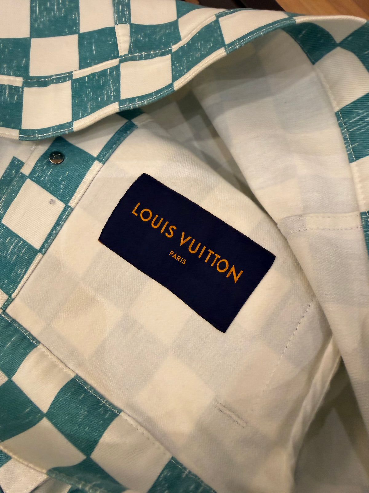 Louis Vuitton Damier Denim
Trucker Jacket - White/ Turquoise