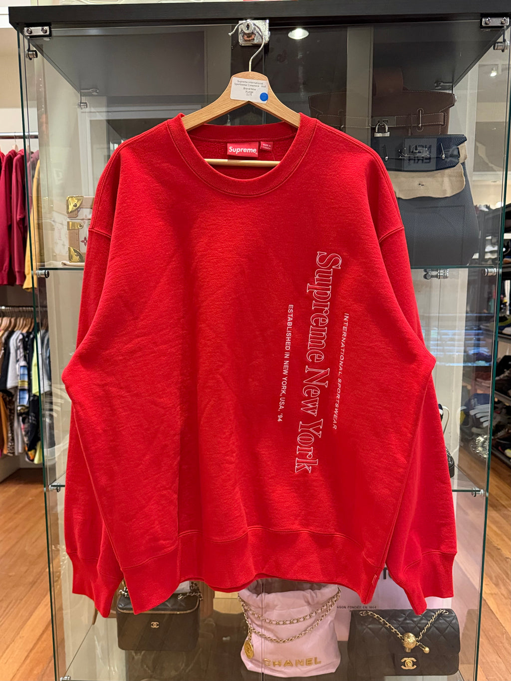 Supreme International
Sportswear Crewneck - Red