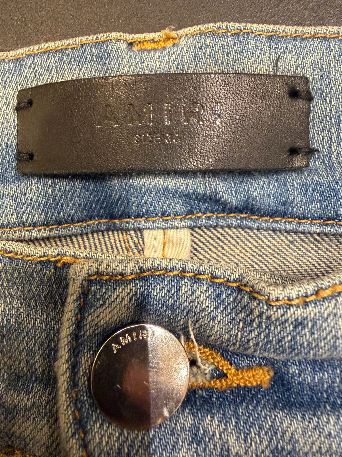 Amiri MX1 Distressed Skinny Jeans - Light Wash / White Patches