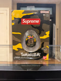 Supreme x Tomogotchi Toy