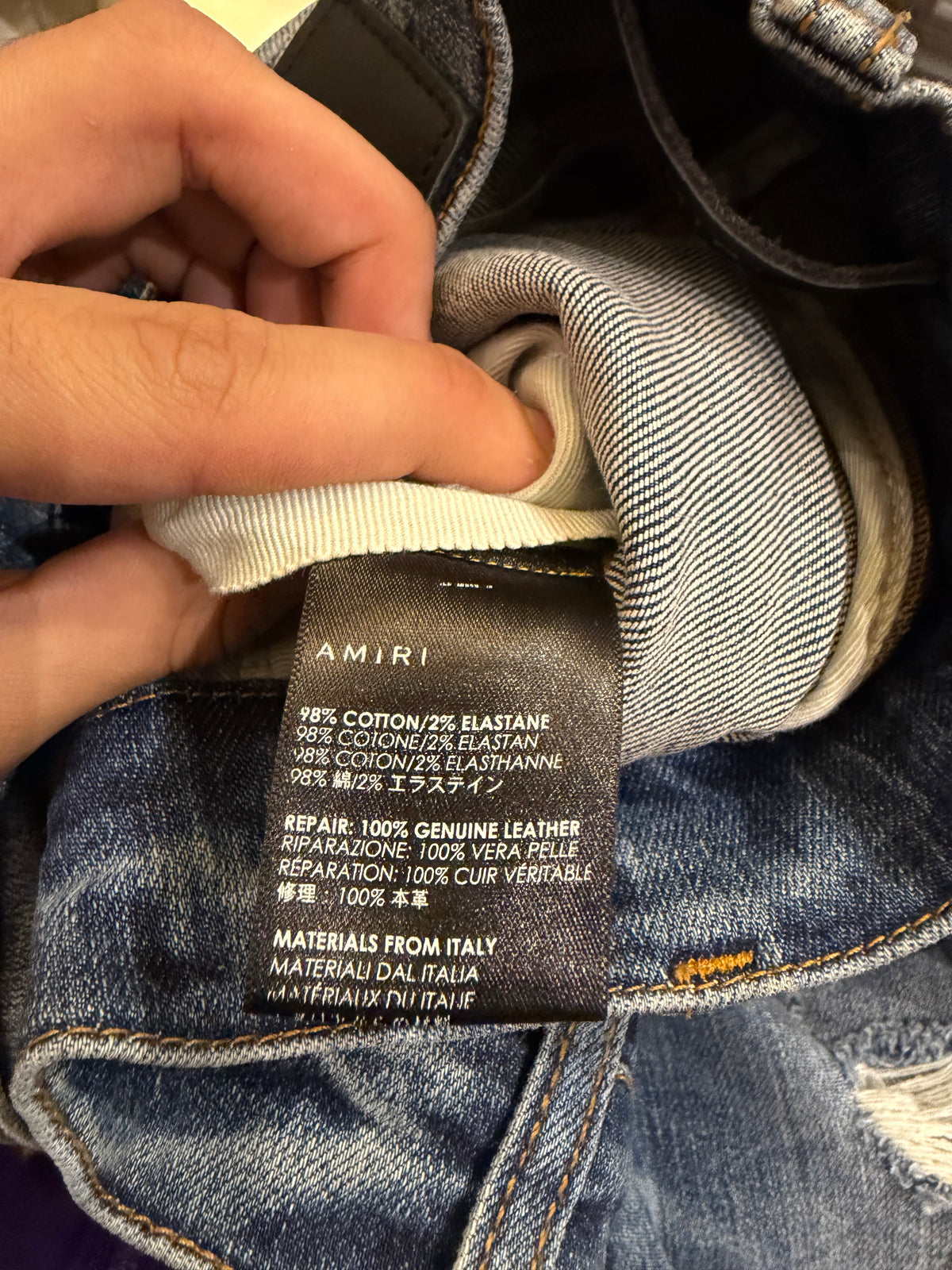 Amiri MX1 Distressed Skinny Jeans - Indigo/Black Patches