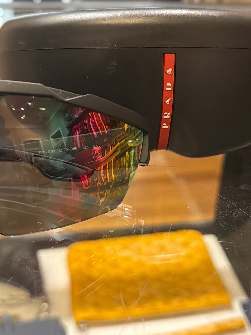 Prada Liena Rossa Shield Sunglasses - Black With Orange Lenses