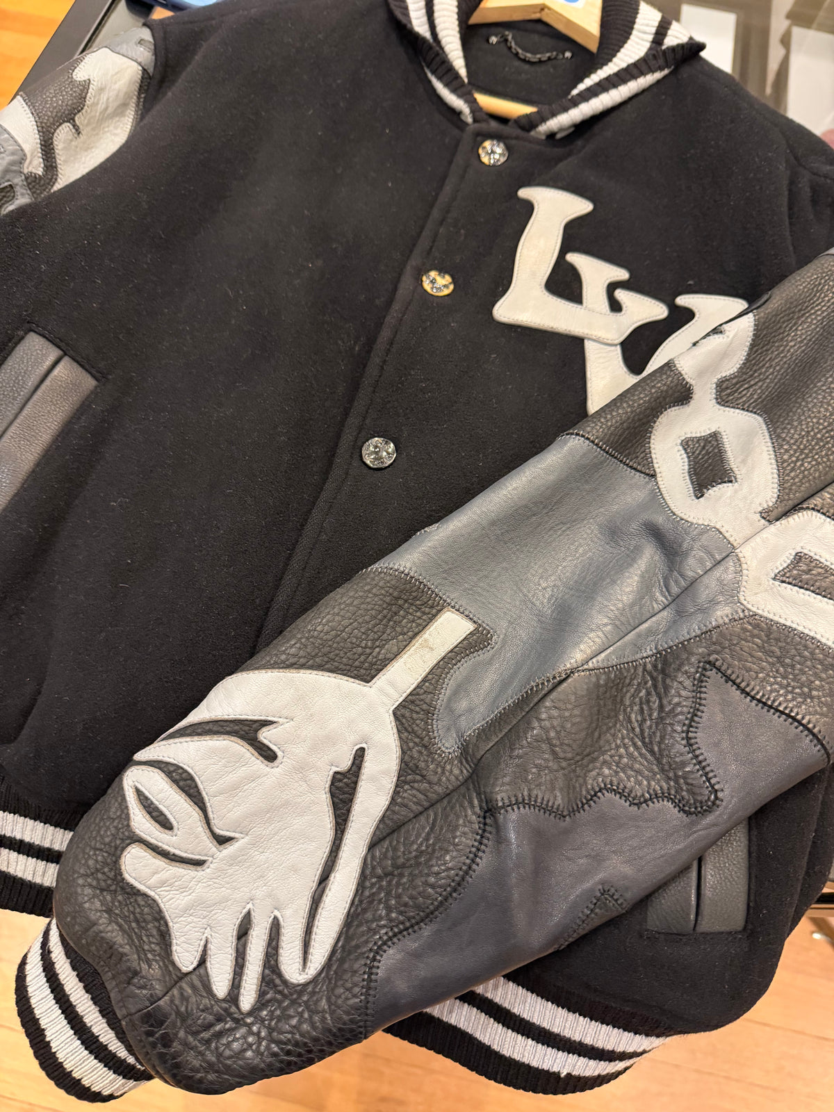 Louis Vuitton Camo LV Patch
Varsity Jacket - Black