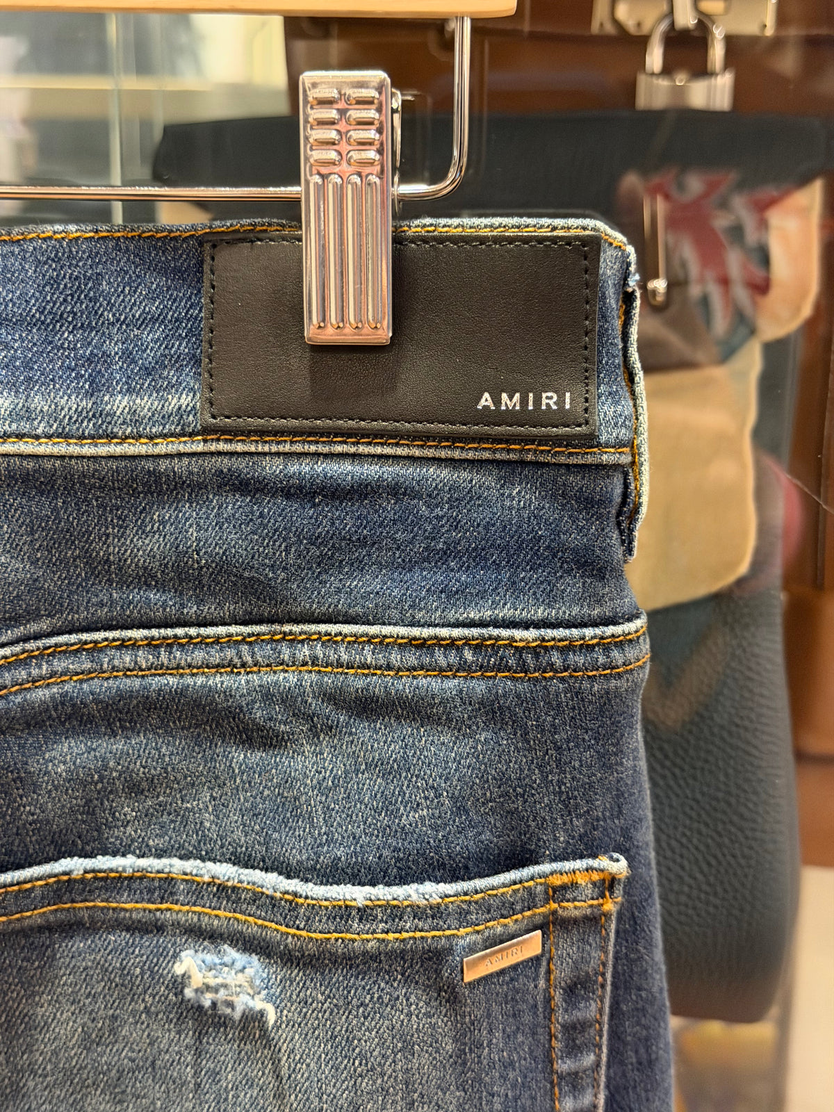 Amiri MX1 Distressed Skinny Jeans - Indigo/Black Patches