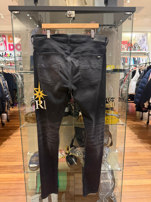 Amiri Starburst Applique Distressed Skinny Jeans - Black