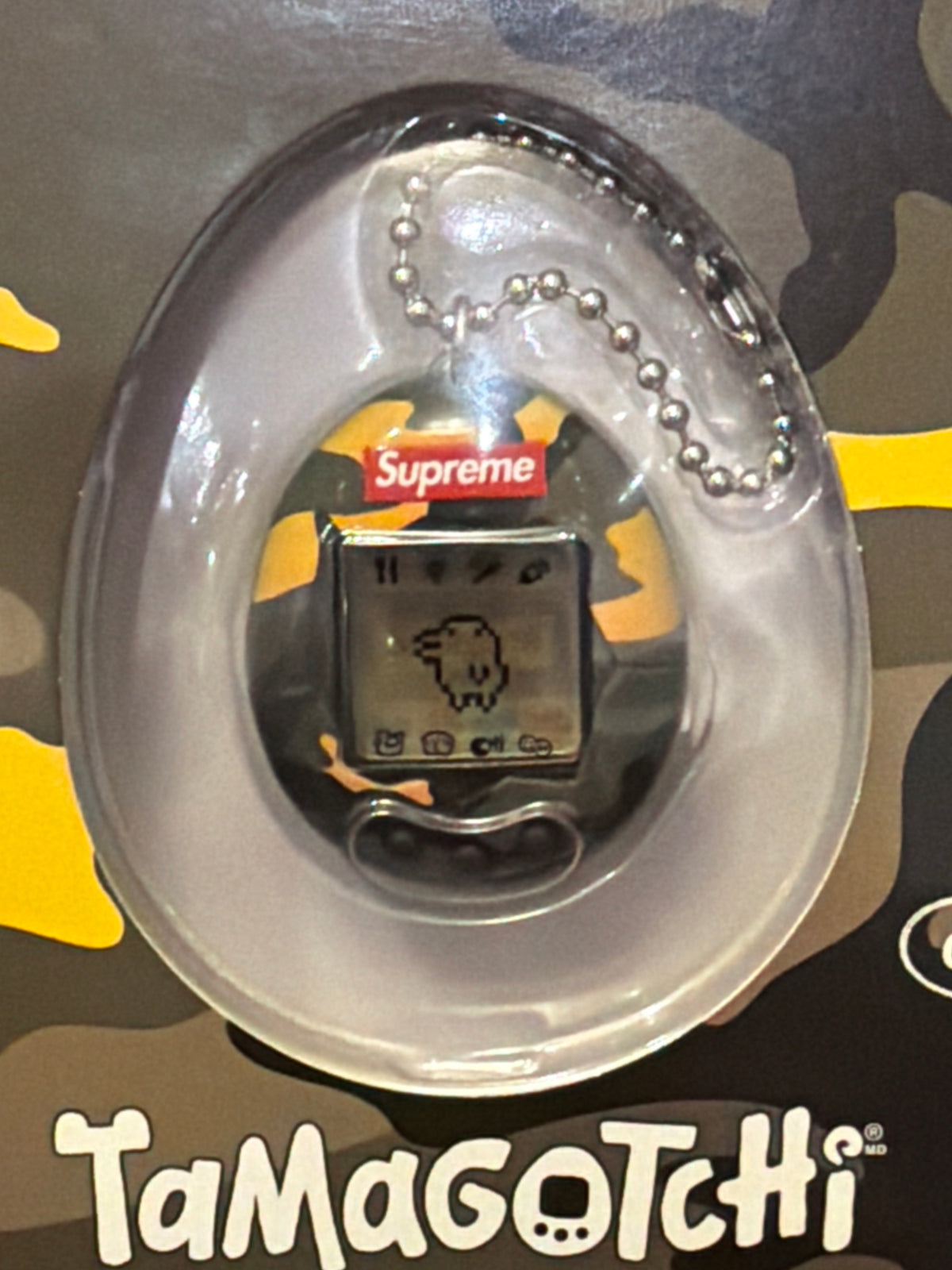 Supreme x Tomogotchi Toy