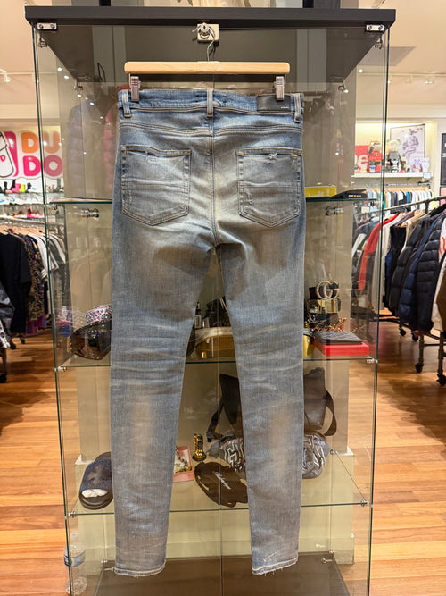 Amiri MX1 Distressed Skinny Jeans - Light Wash/Orange Patches
