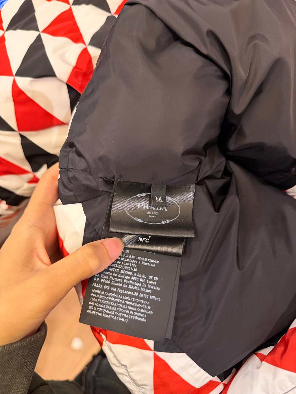 Prada Triangle Logo Down
Puffer Jacket
Pre-Owned