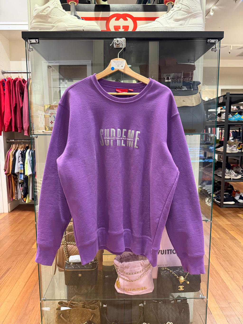 Supreme World Famous
Crewneck - Purple