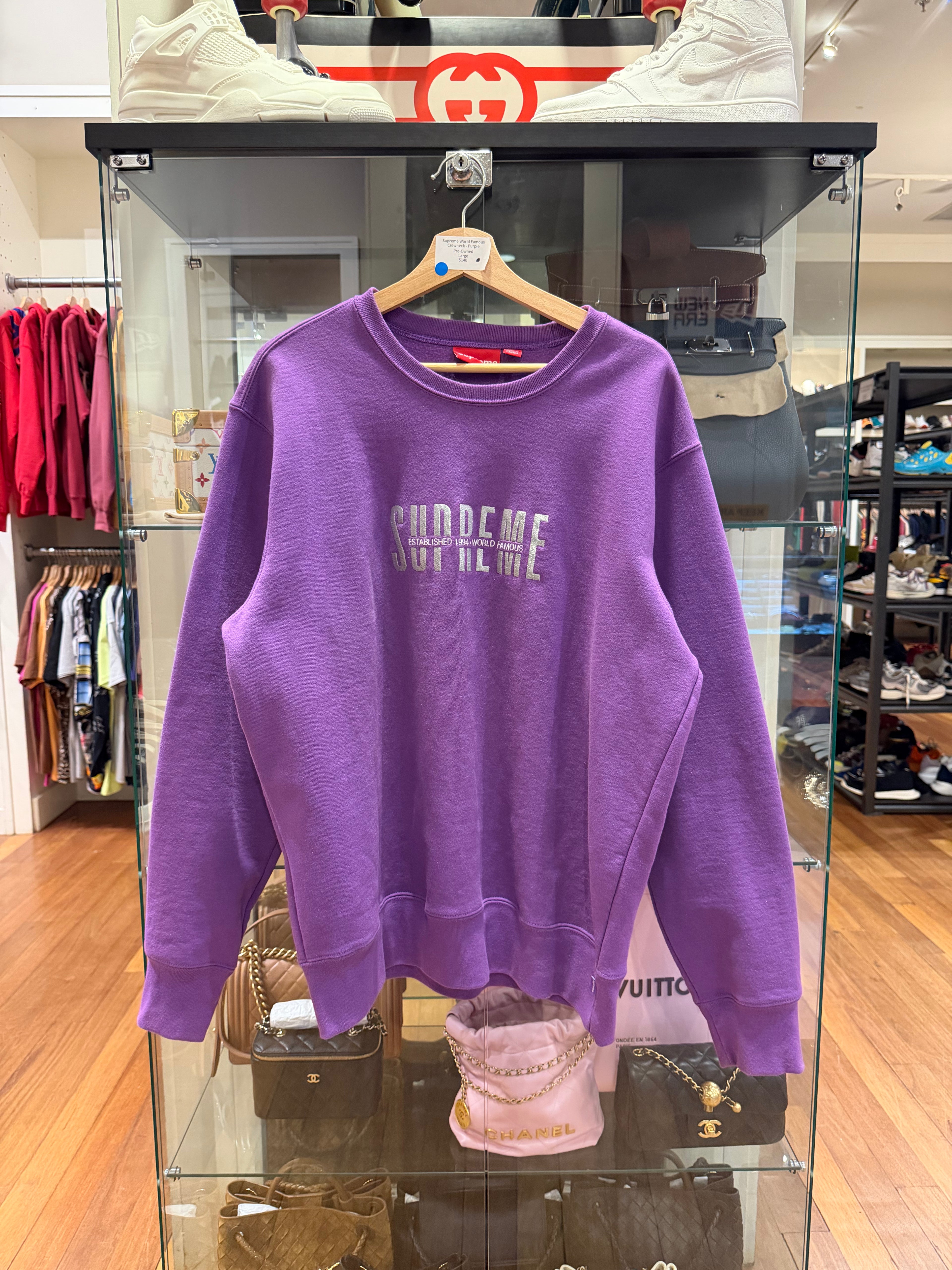 Supreme World Famous
Crewneck - Purple