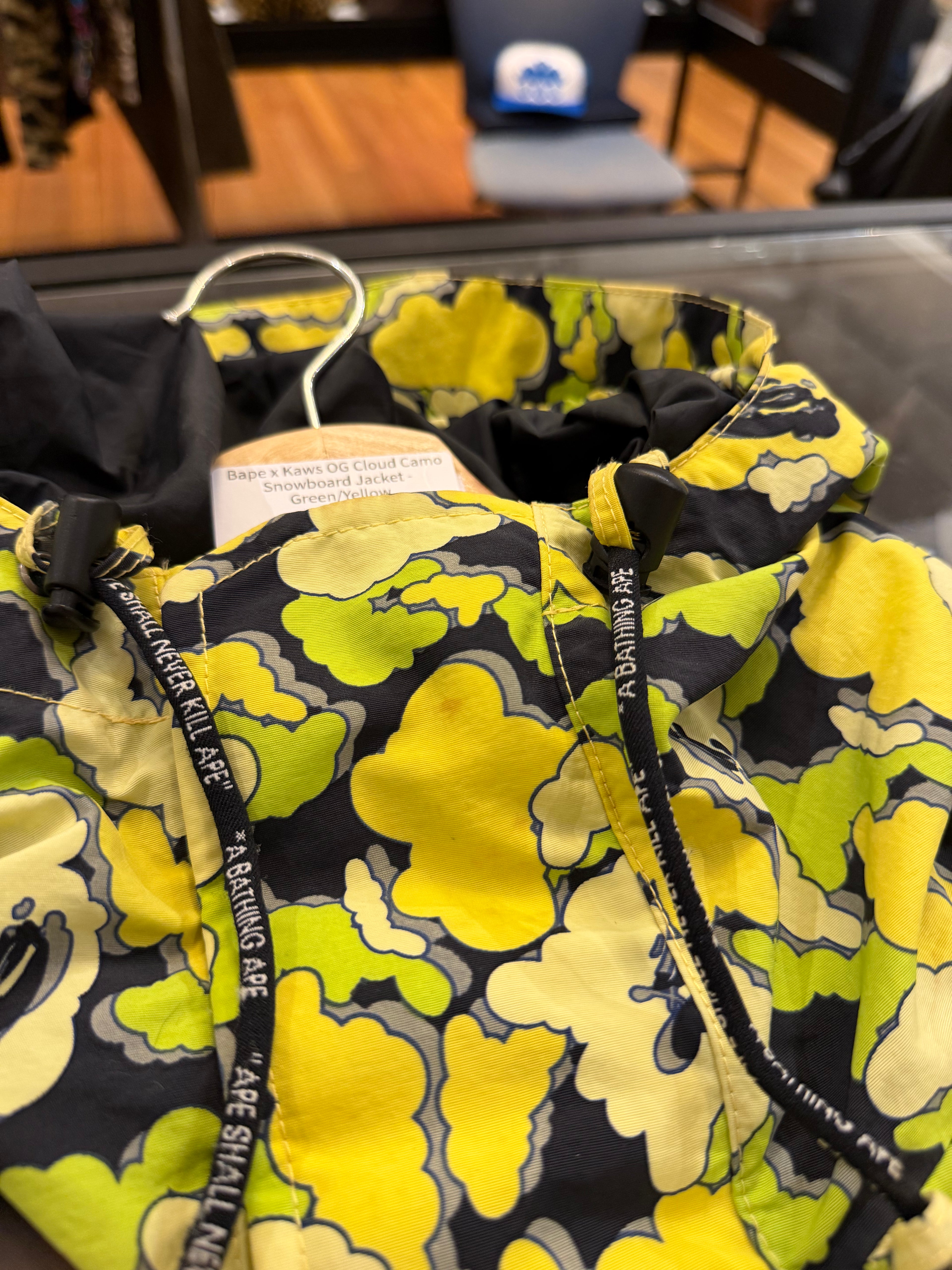 Bape x Kaws OG Cloud Camo
Snowboard Jacket -
Green/Yellow