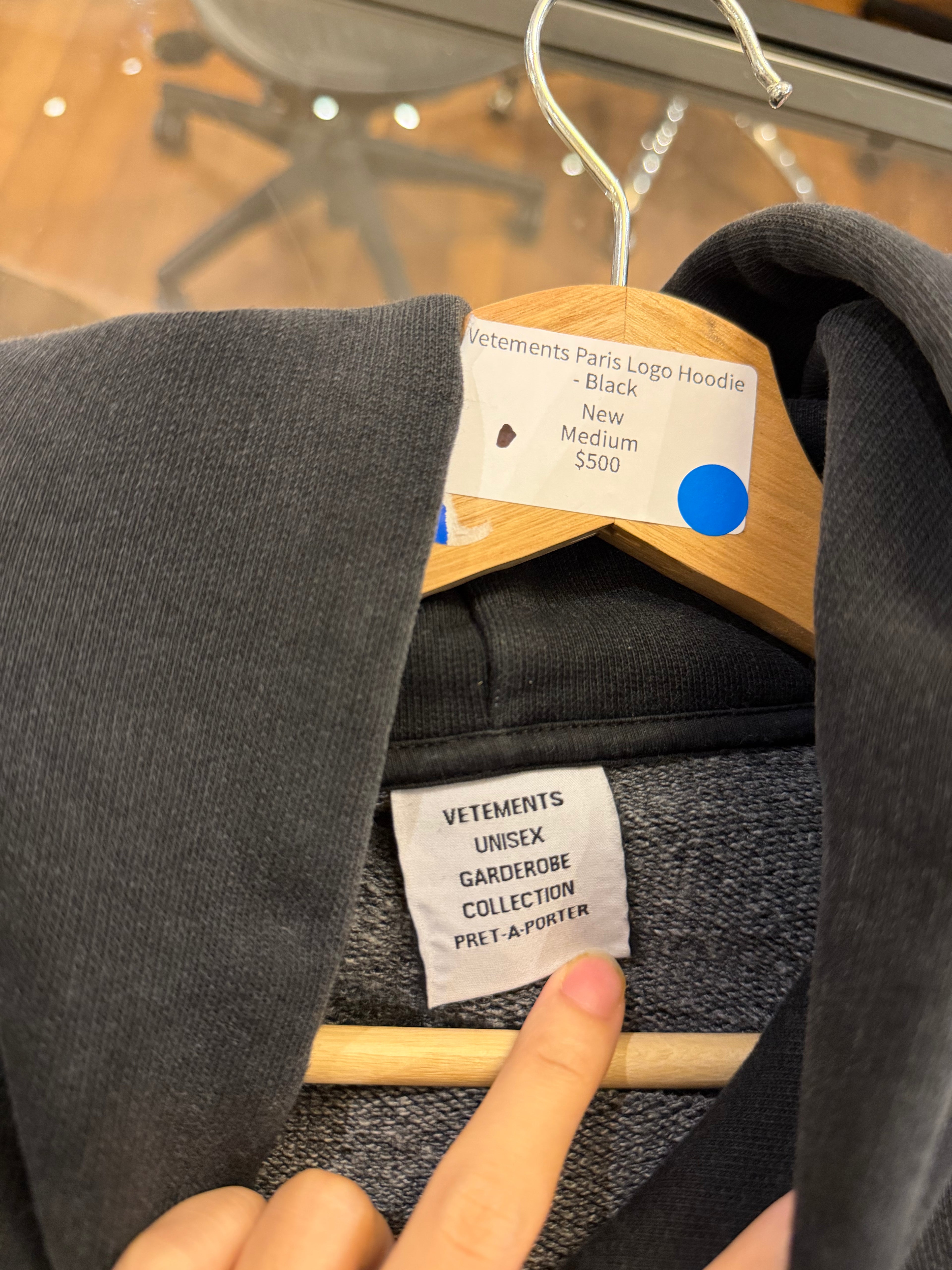 Vetements Paris Logo Hoodie
- Black