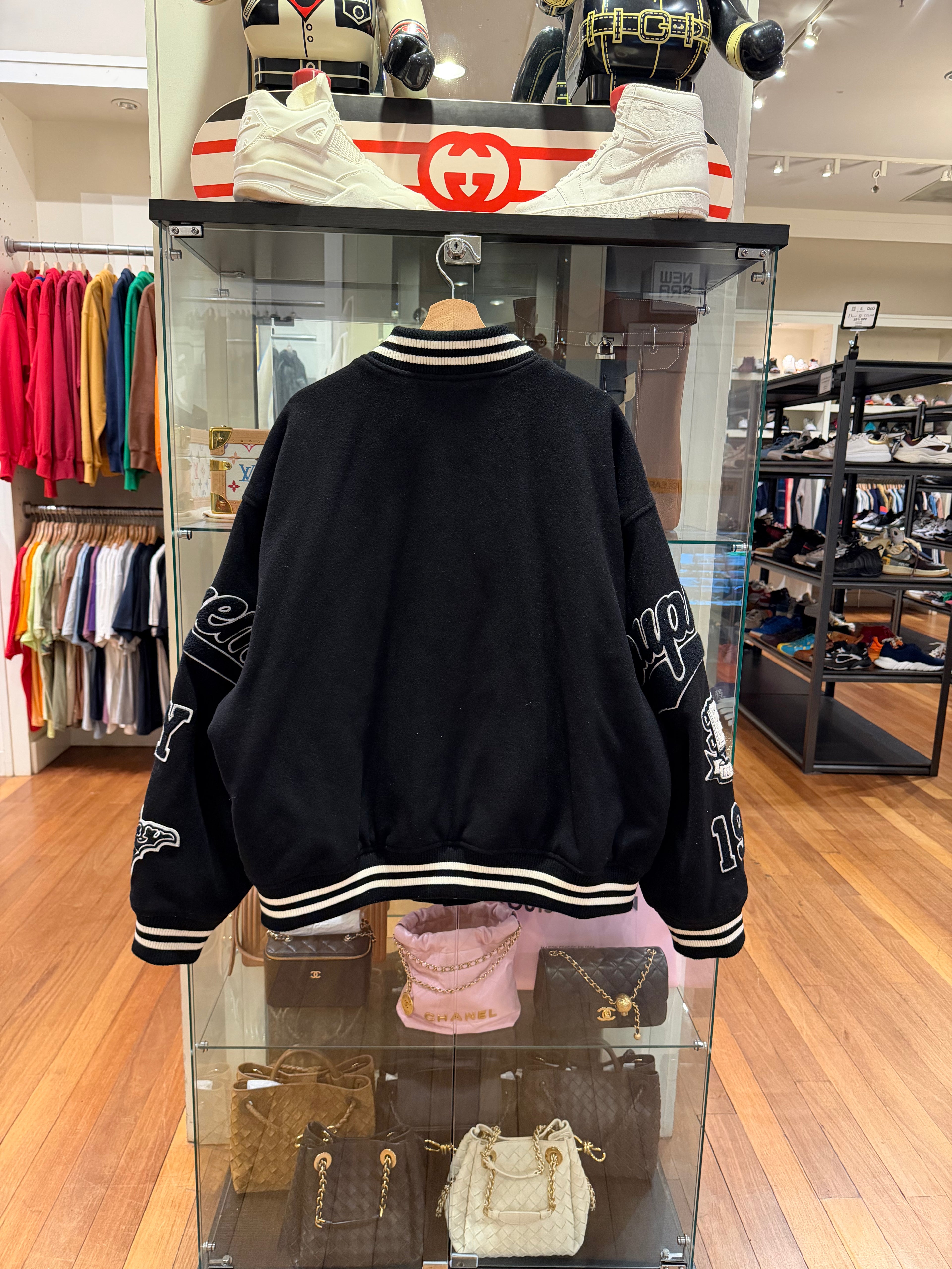 Supreme Veritas Varsity
Jacket - Black