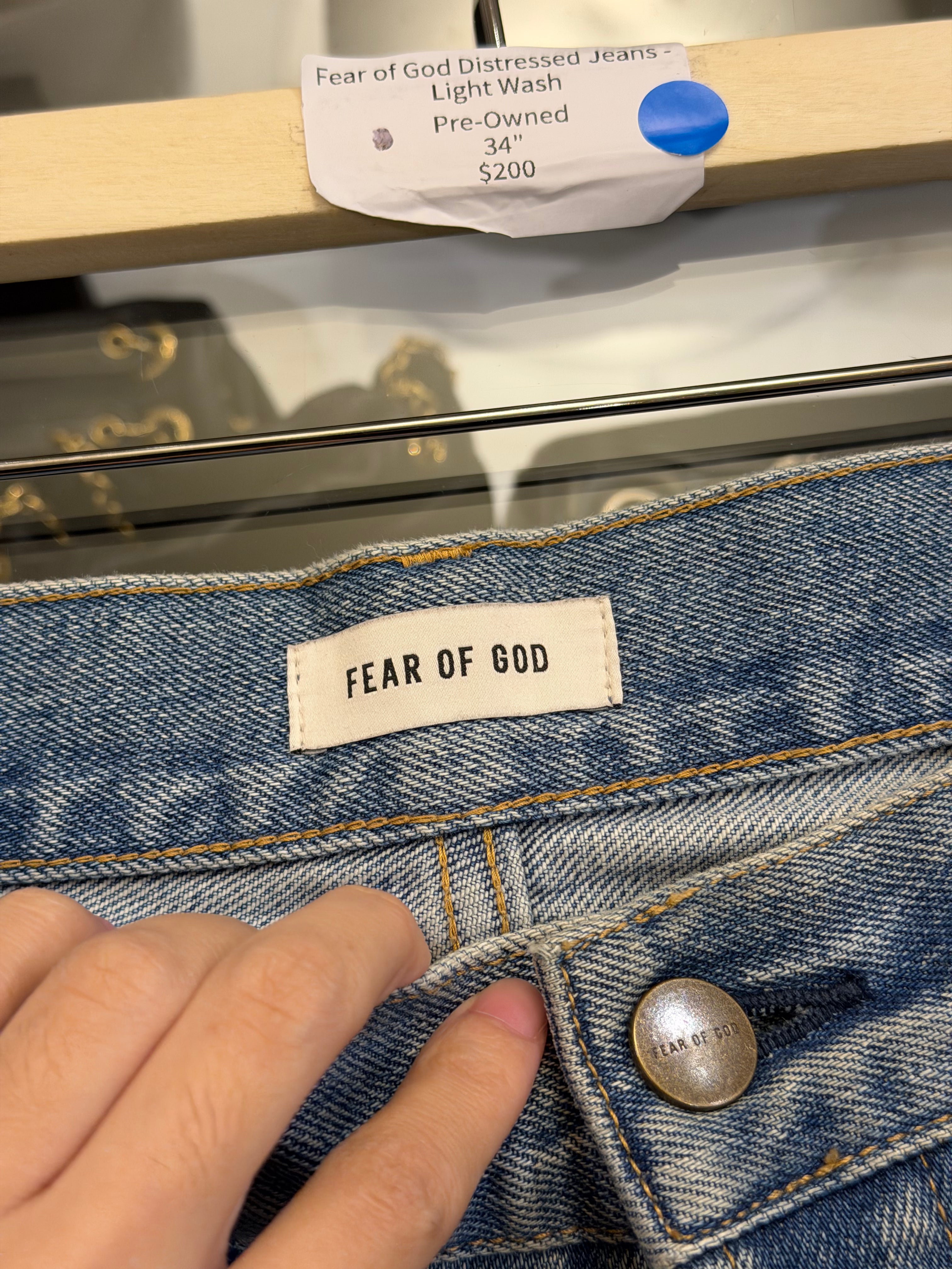 Fear of God Distressed Jeans -
Light Wash