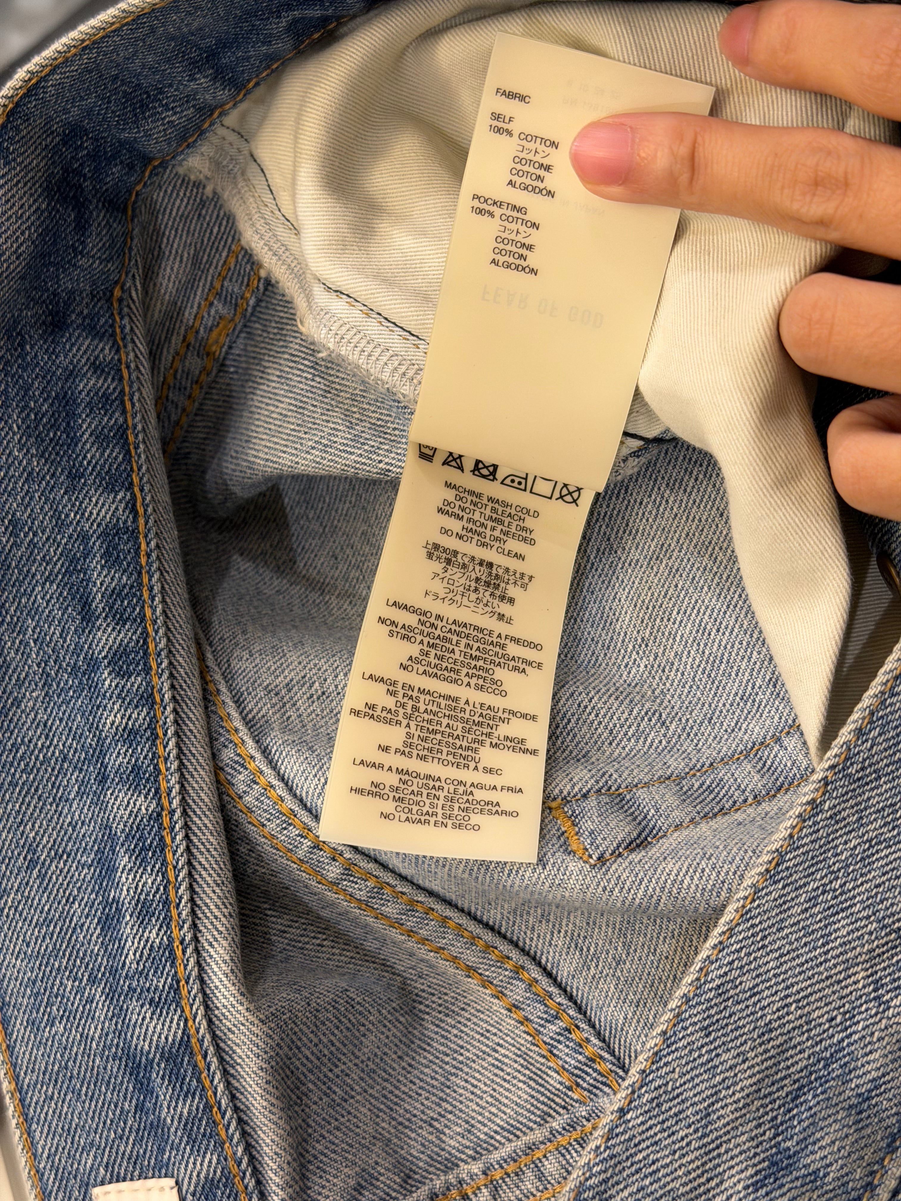 Fear of God Distressed Jeans -
Light Wash