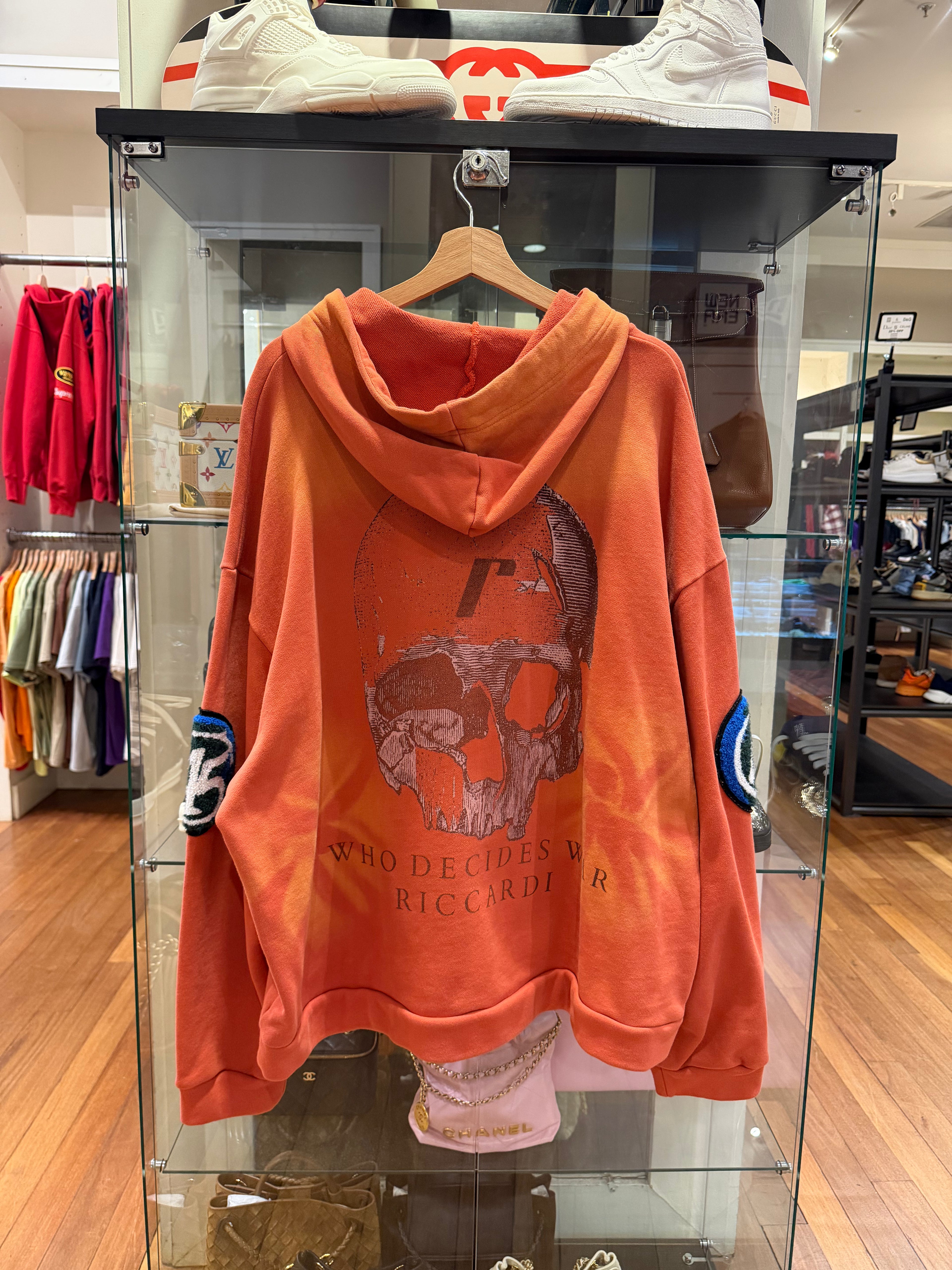 Who Decides War x Ricardi
Collab Hoodie - Orange