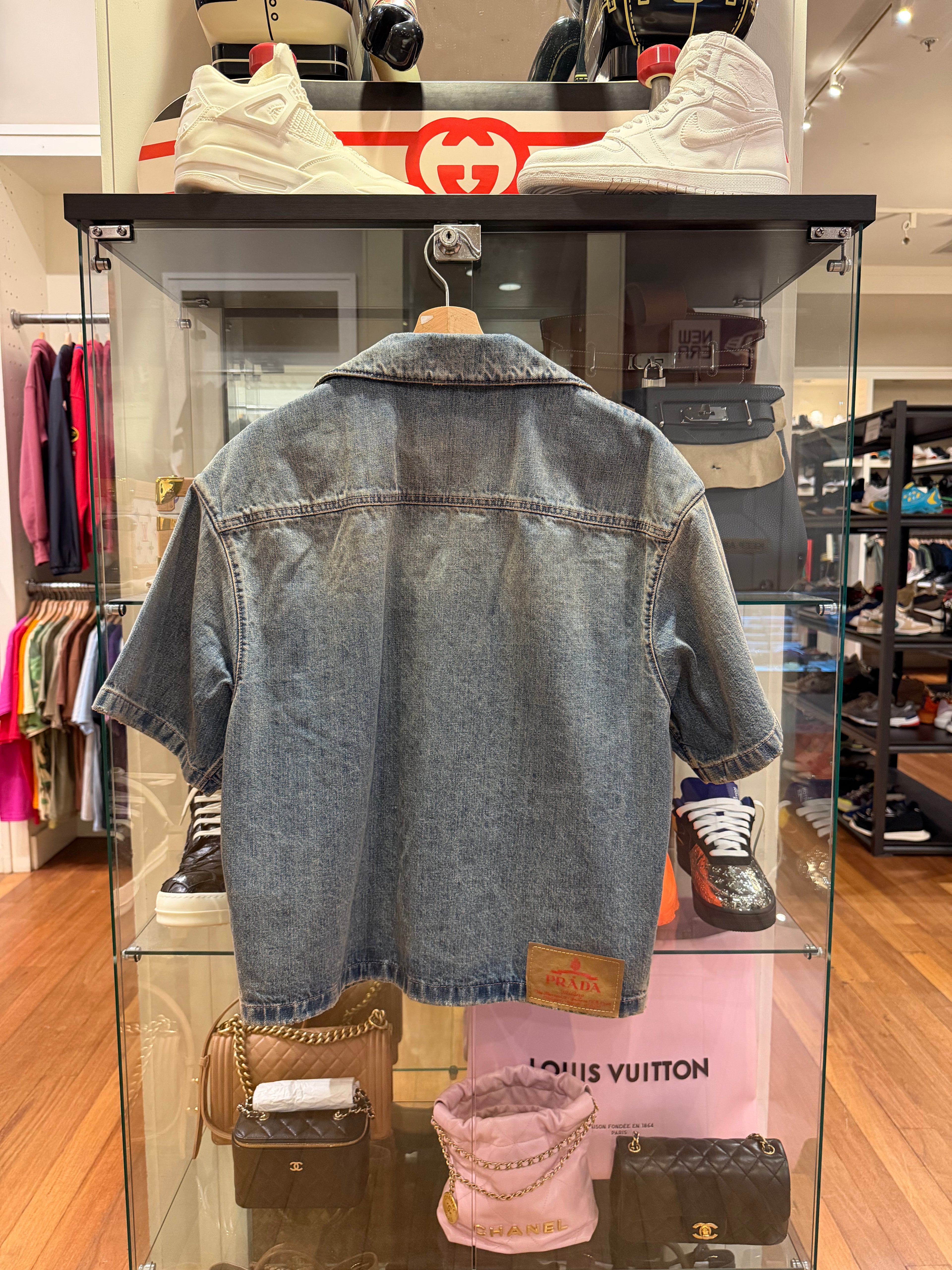 Prada Boxy-Fit Bowling
Denim Shirt