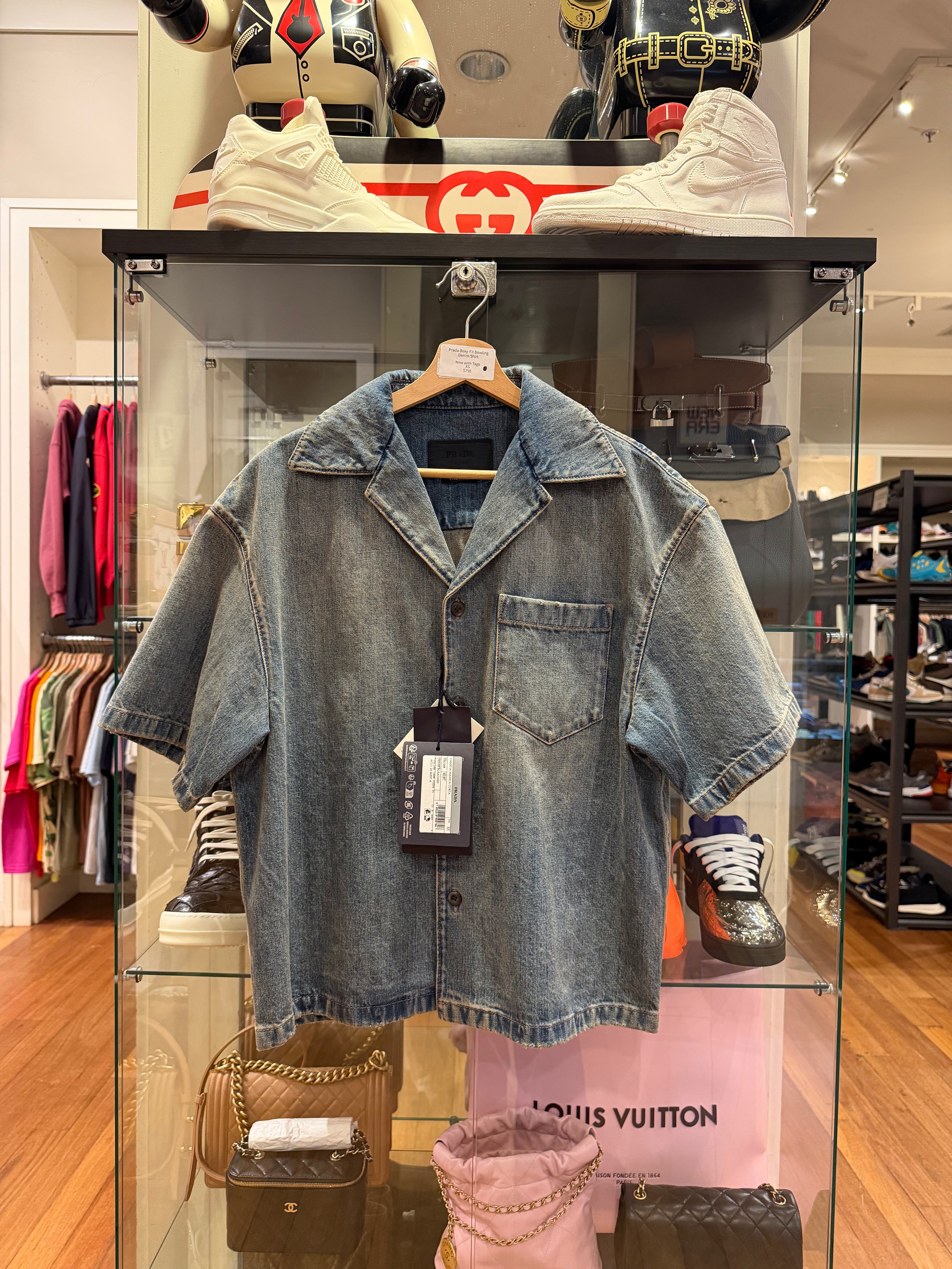 Prada Boxy-Fit Bowling
Denim Shirt