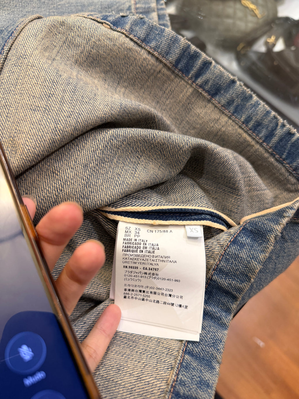 Prada Boxy-Fit Bowling
Denim Shirt