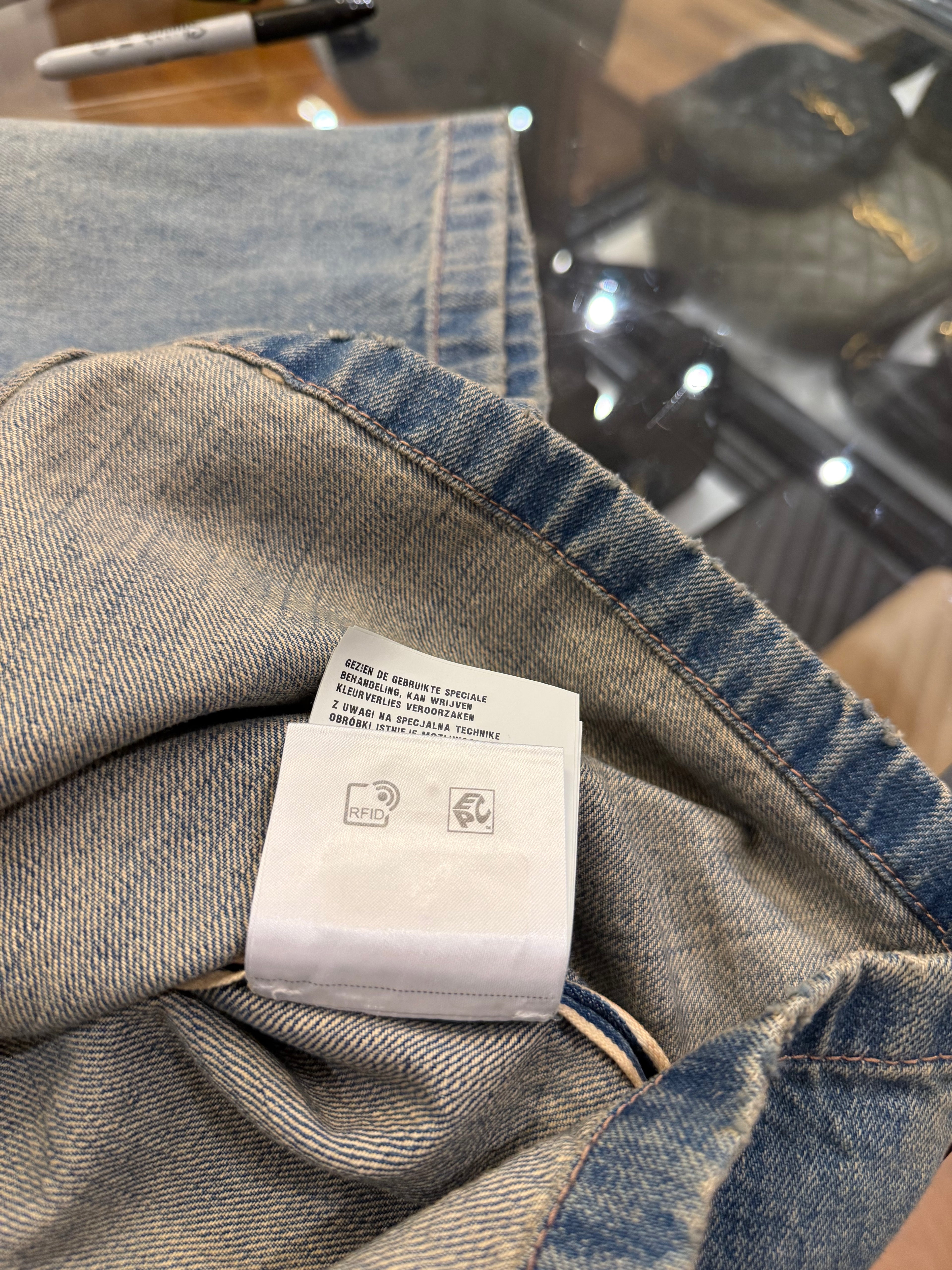 Prada Boxy-Fit Bowling
Denim Shirt