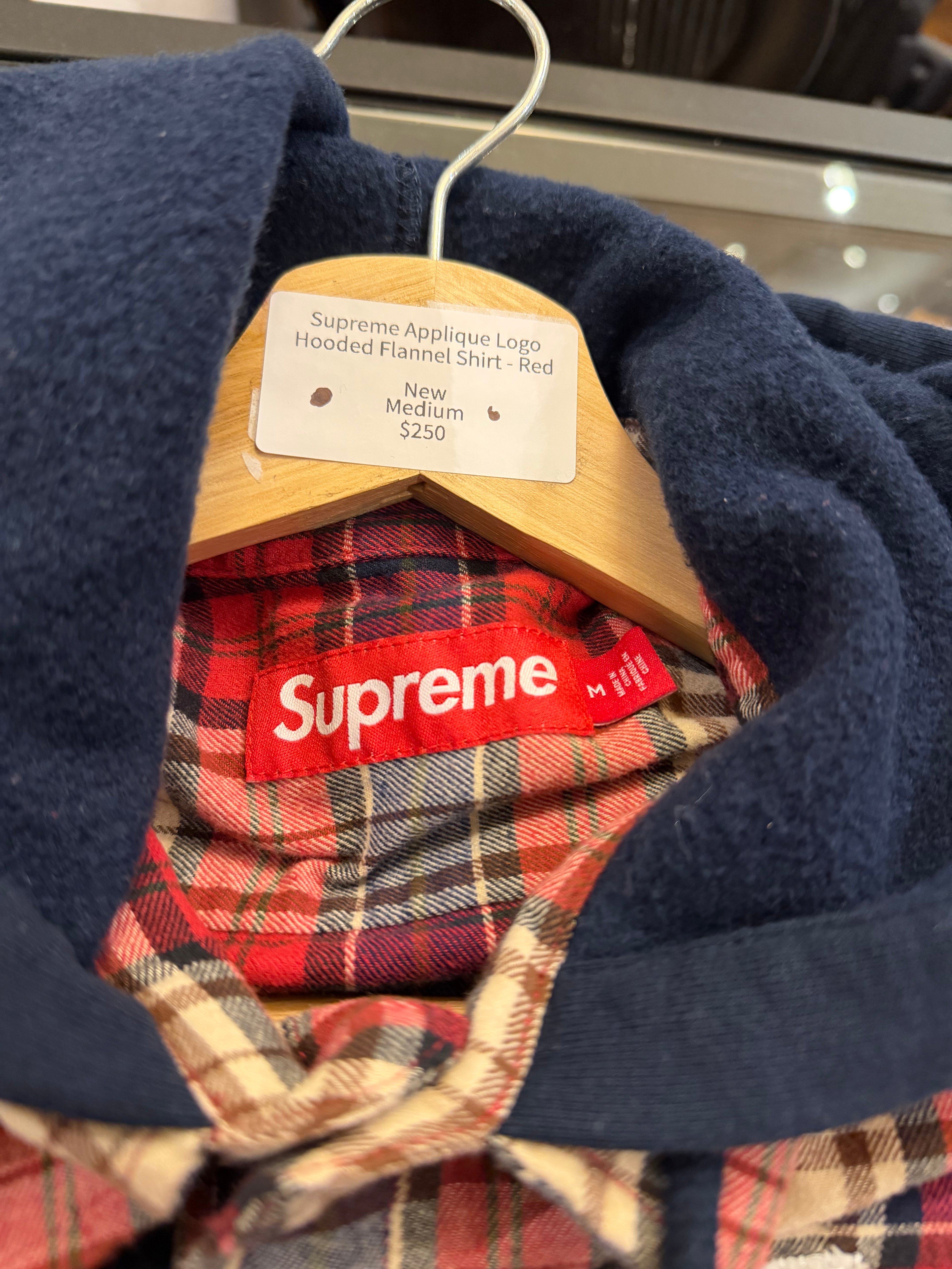 Supreme Applique Logo
Hooded Flannel Shirt - Red