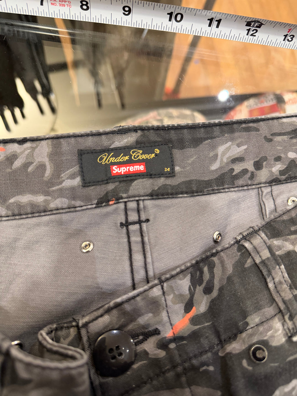 Undercover x Supreme
Studded Camo Pants