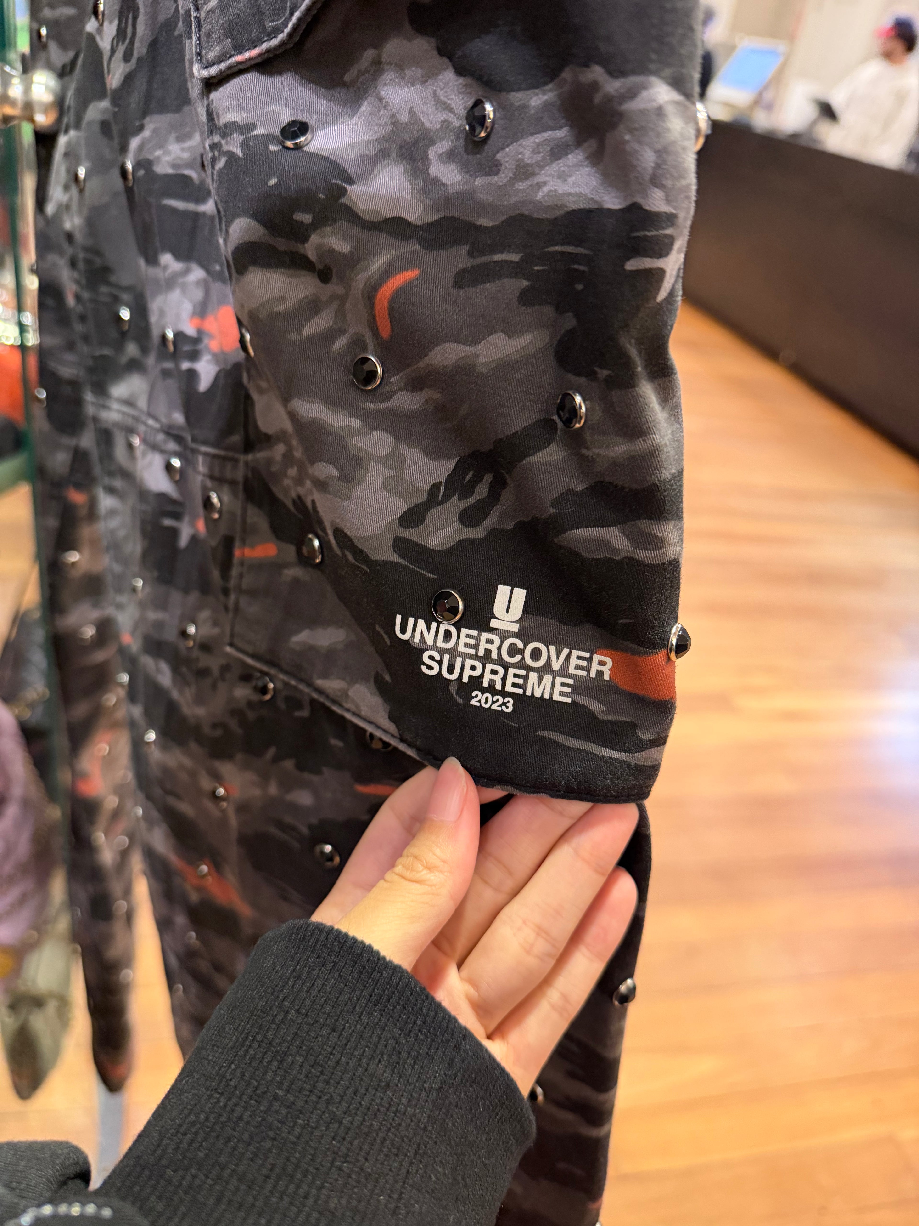 Undercover x Supreme
Studded Camo Pants