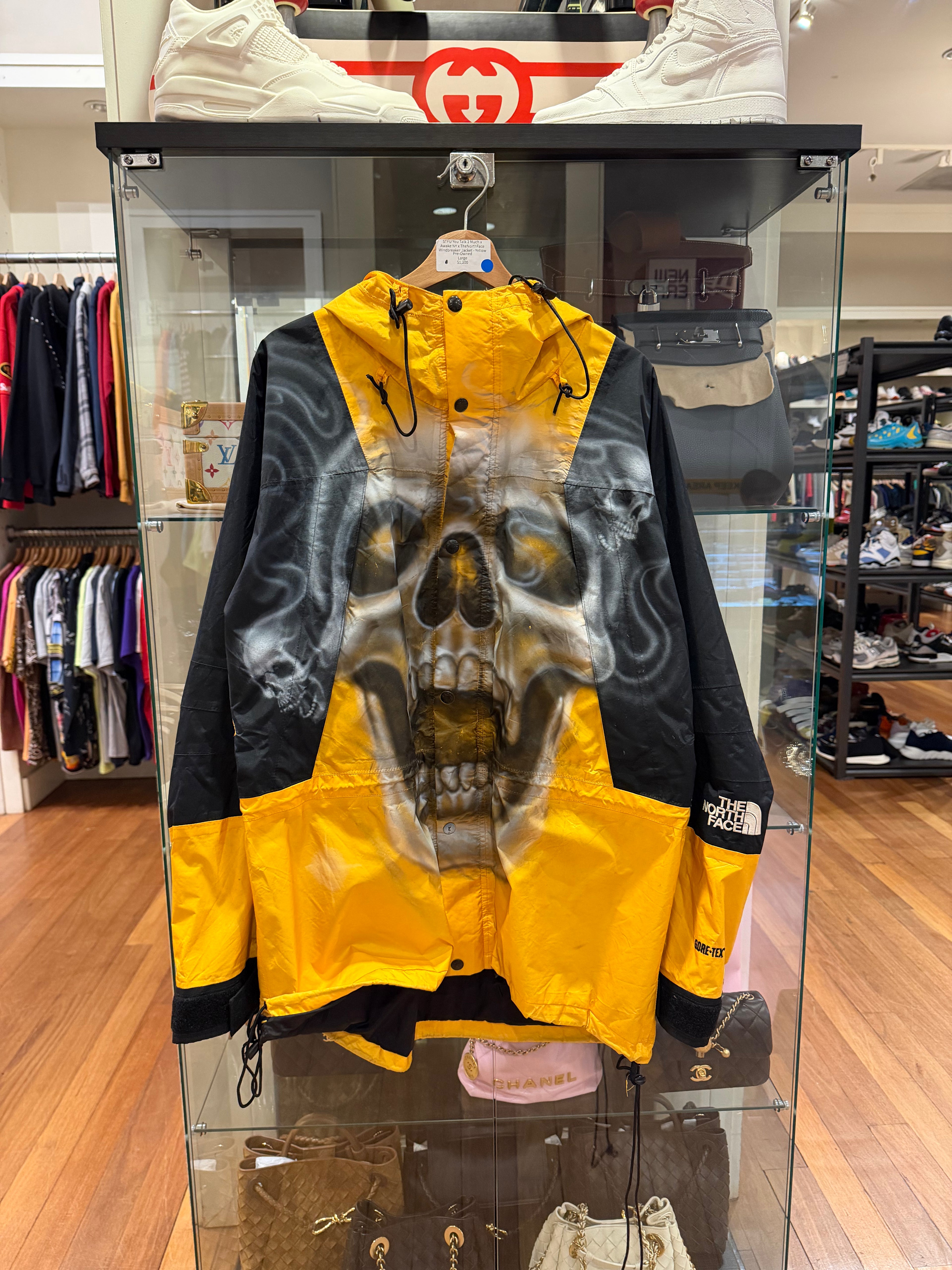 STFU You Talk 2 Much x
Awake NY x TheNorth Face
Windbreaker Jacket - Yellow
Pre-Owned