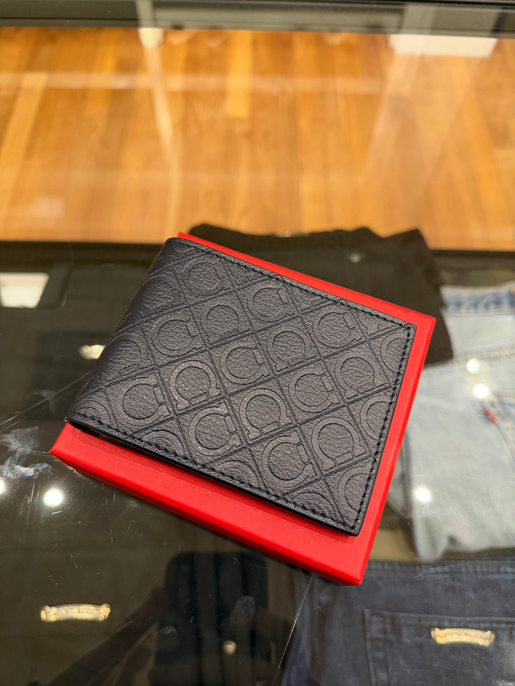 Salvatore Ferragamo Gancini Pattern Embossed Leather Bifold Wallet