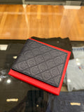 Salvatore Ferragamo Gancini Pattern Embossed Leather Bifold Wallet