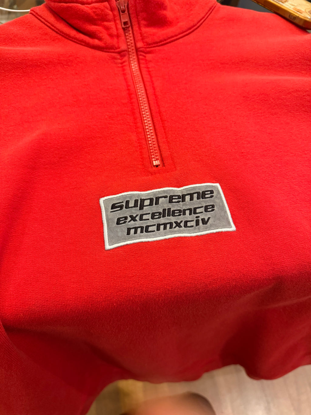 Supreme ‘Excellence’ Quarter Zip- Red
