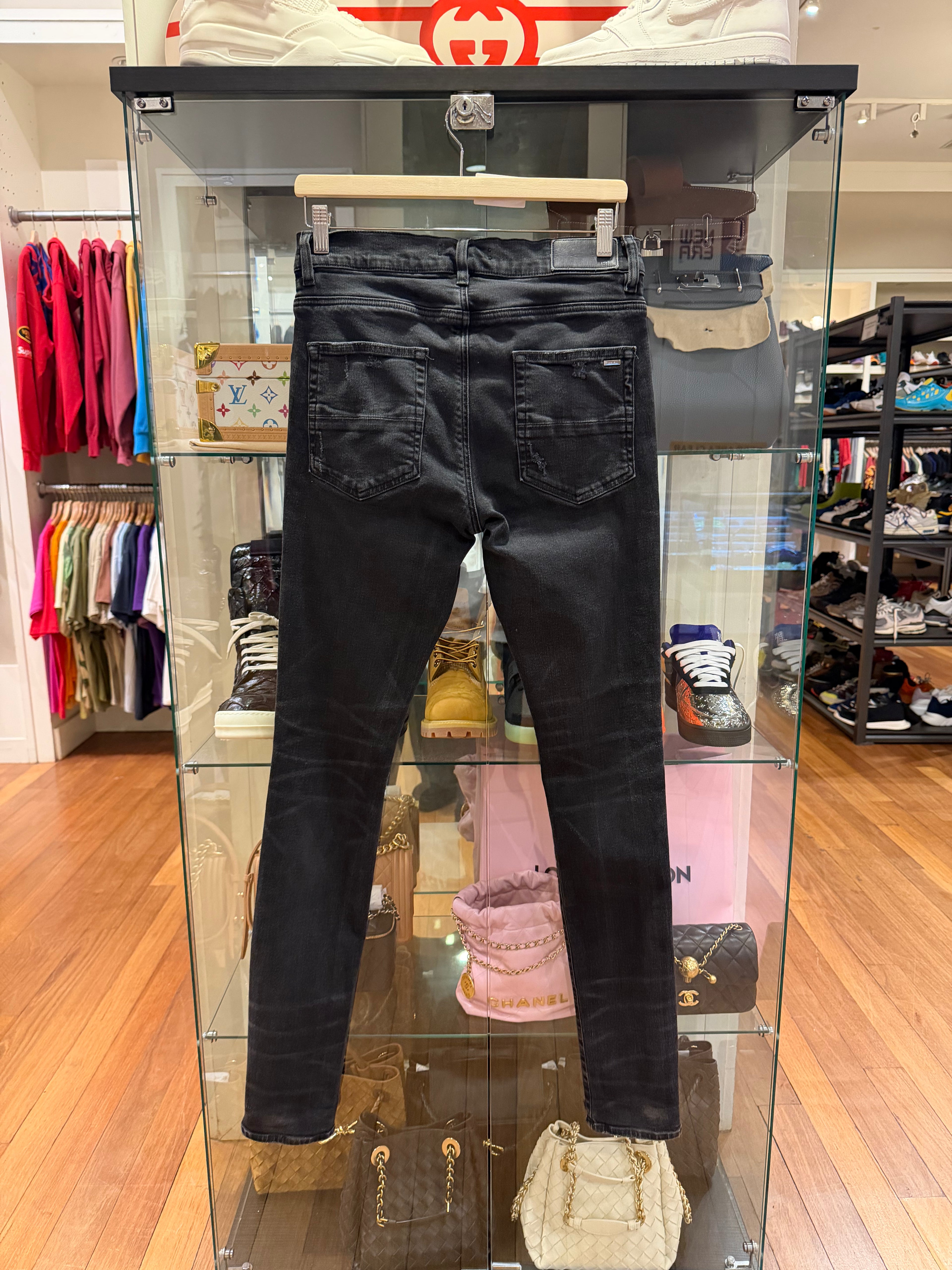 Amiri Distressed Denim Jeans
- Black