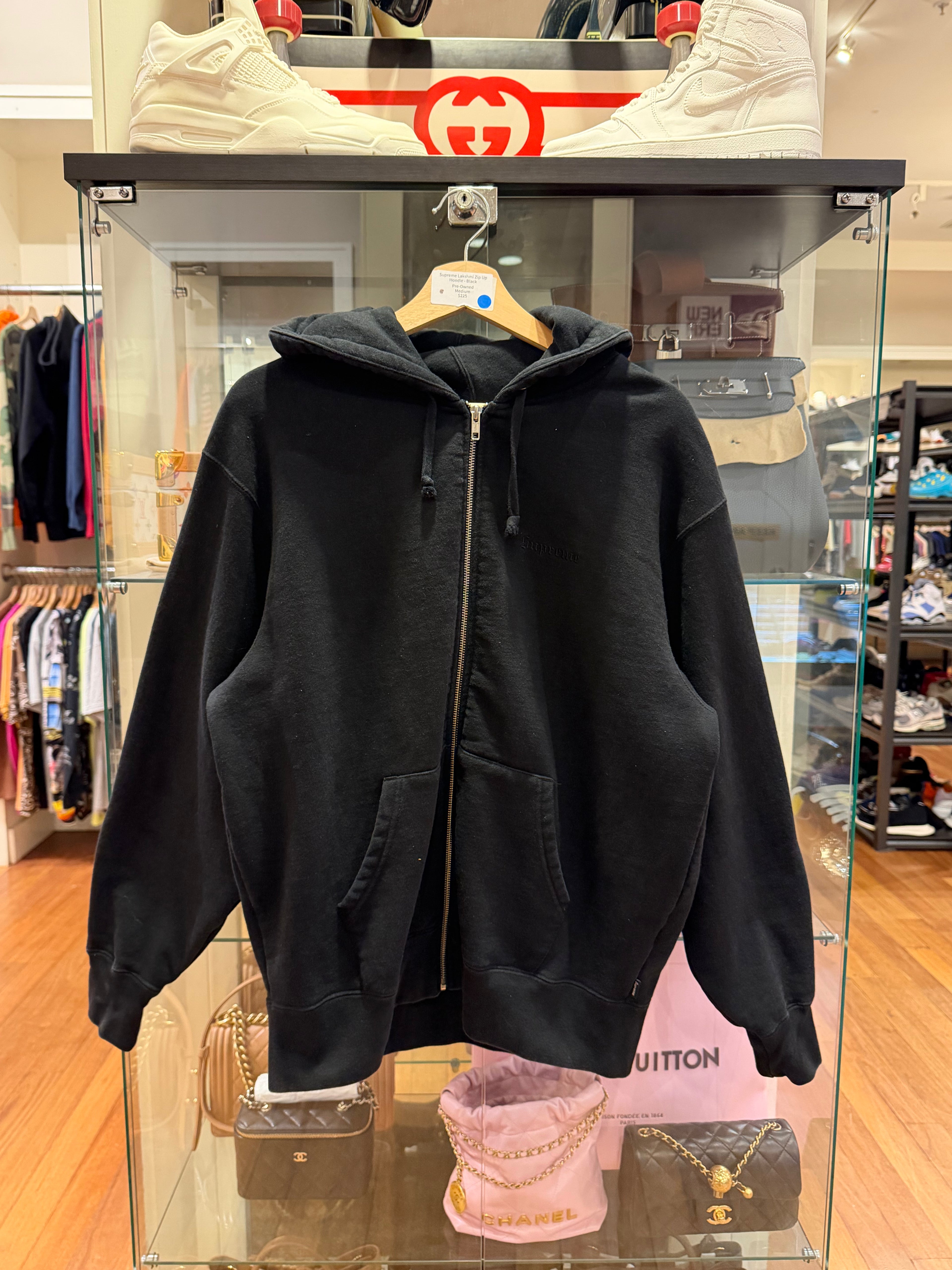 Supreme Lakshmi Zip Up
Hoodie - Black